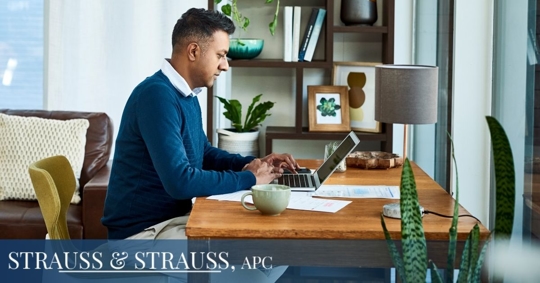 Male employee at his work desk